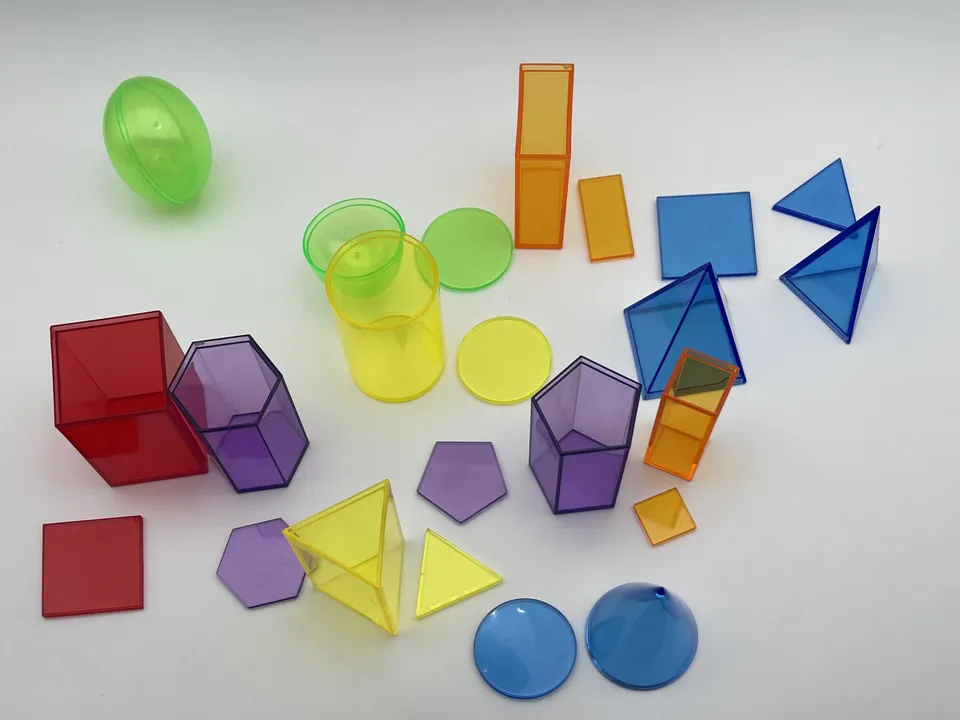 Set 12 solidi geometrici traslucidi bambini