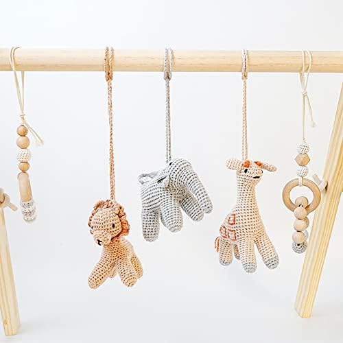 Piccoli Toys Africa palestrina neonato cotone e legno con sonagli