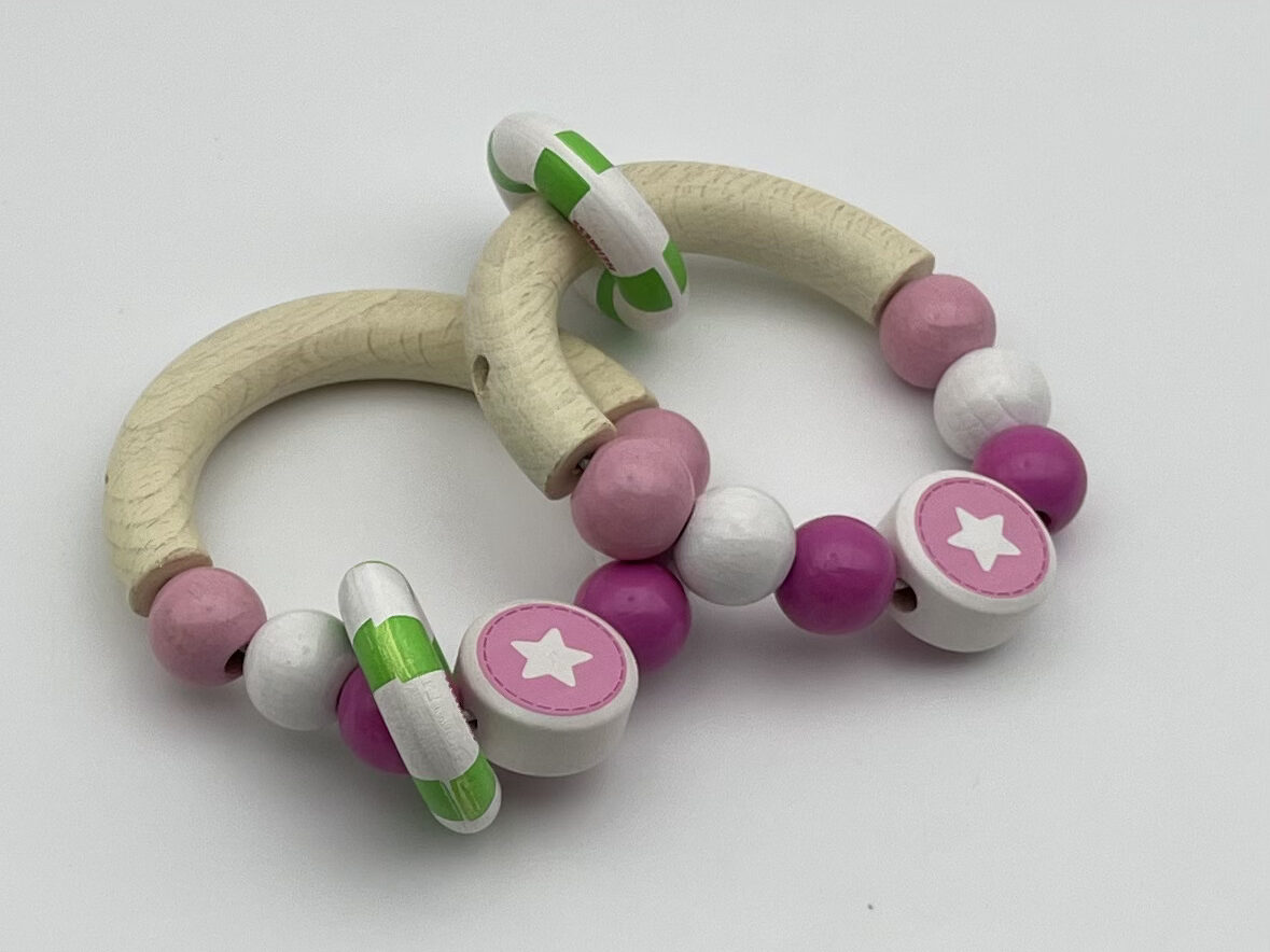 The Dida sonaglio legno elefante rosa neonato morditore