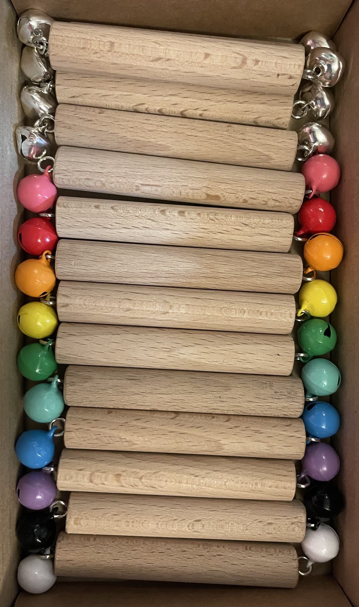 The Dida Sonaglio Montessori legno blu campanelli