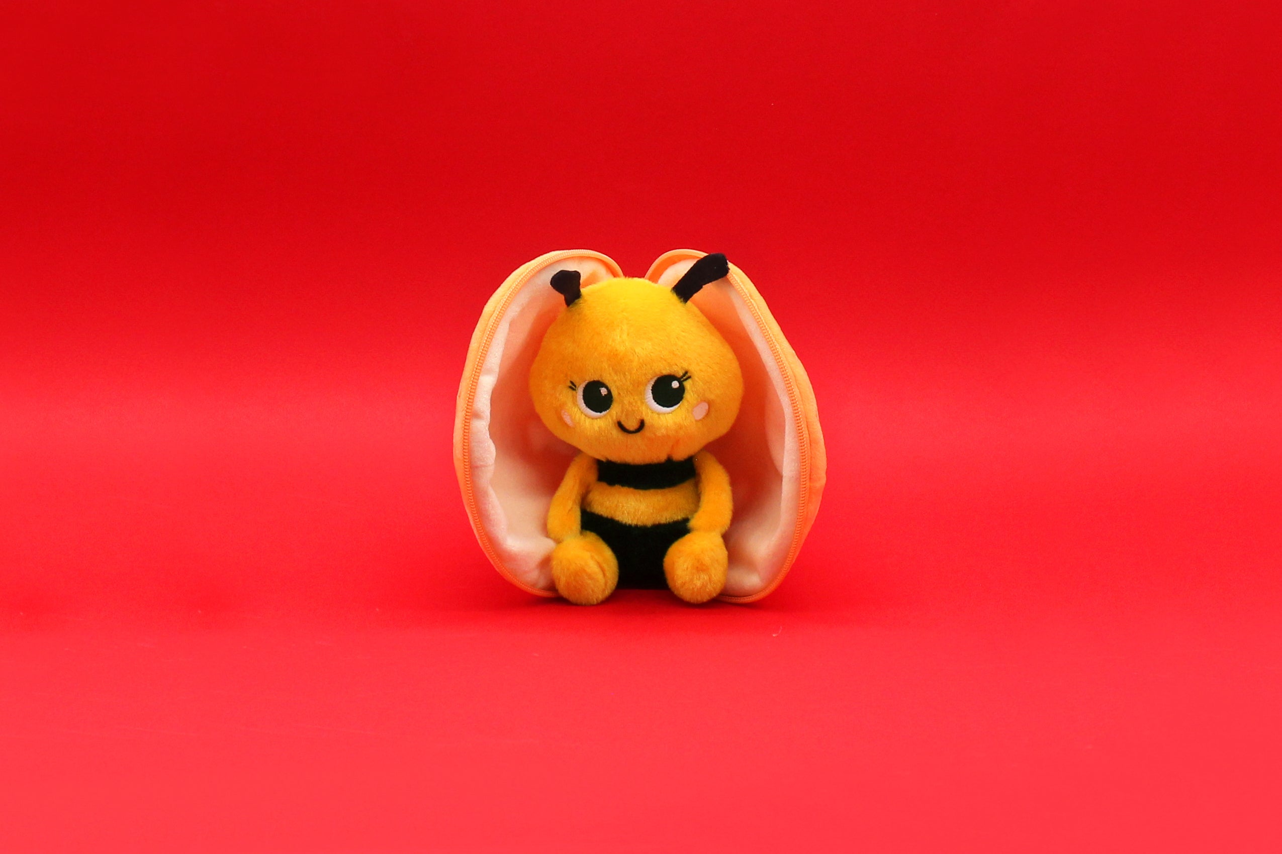 Les Deglingos Flipetz Buzzet peluche ape mandarino reversibile