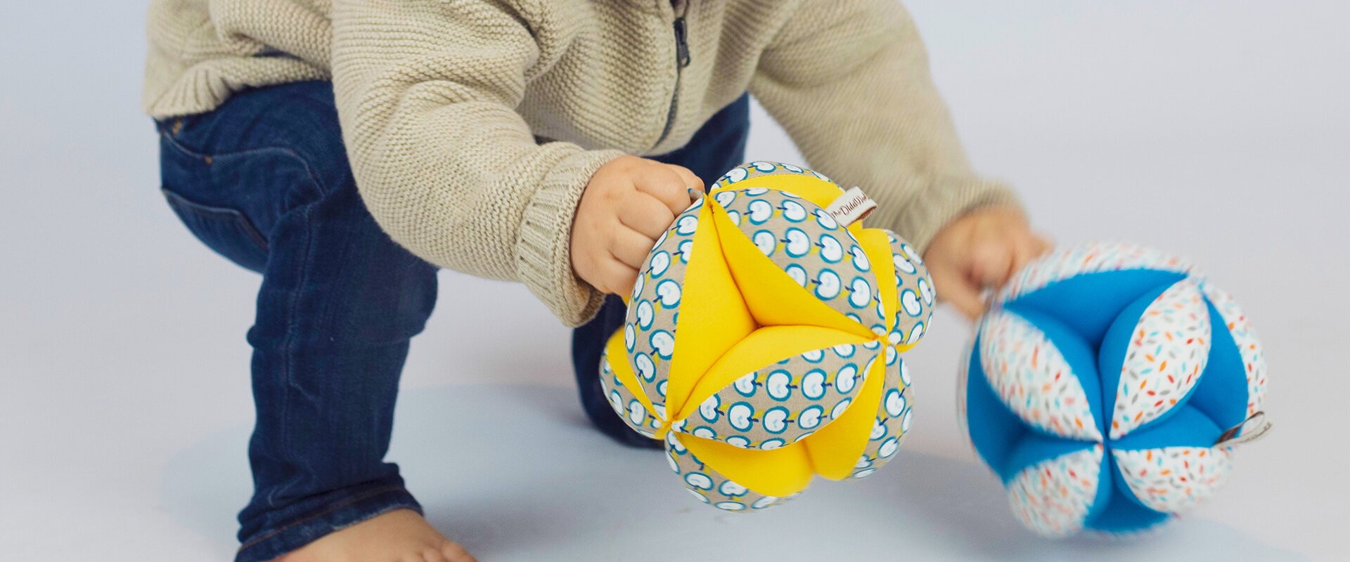 The Dida palla Montessori cotone con sonaglio lavabile