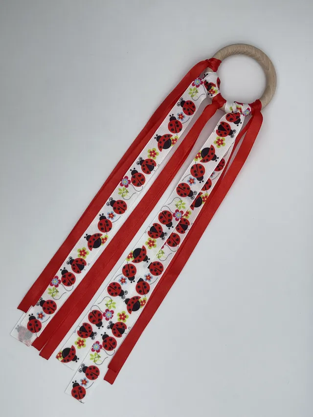 The Dida Waldorf anello nastri coccinelle rosso legno